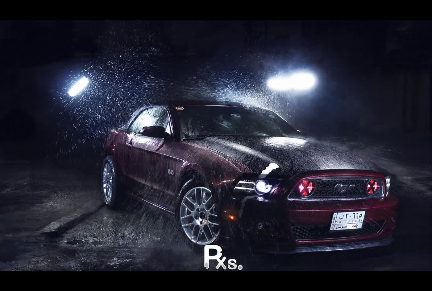 Ford Mustang GT under mixed street and hand-carried light