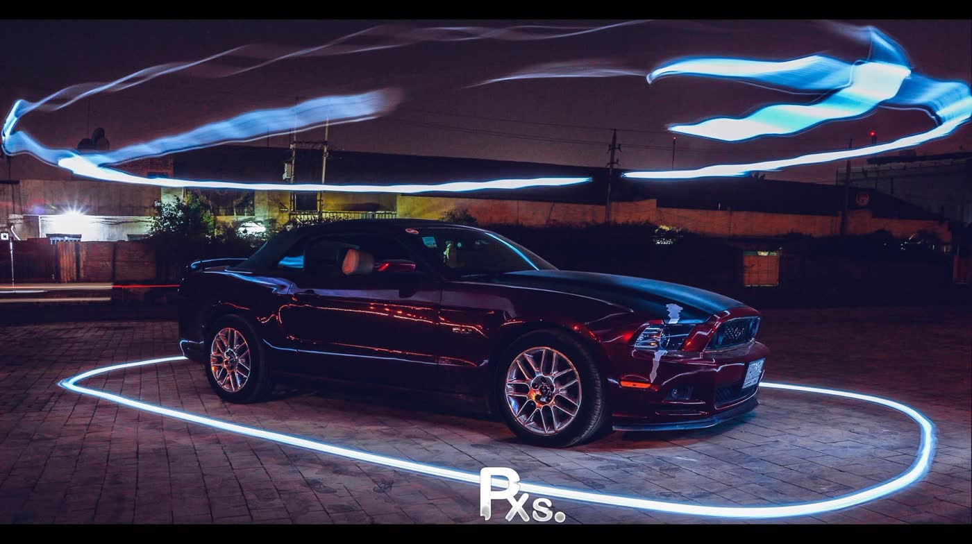 Ford Mustang convertible wrapped in a single-exposure light trail